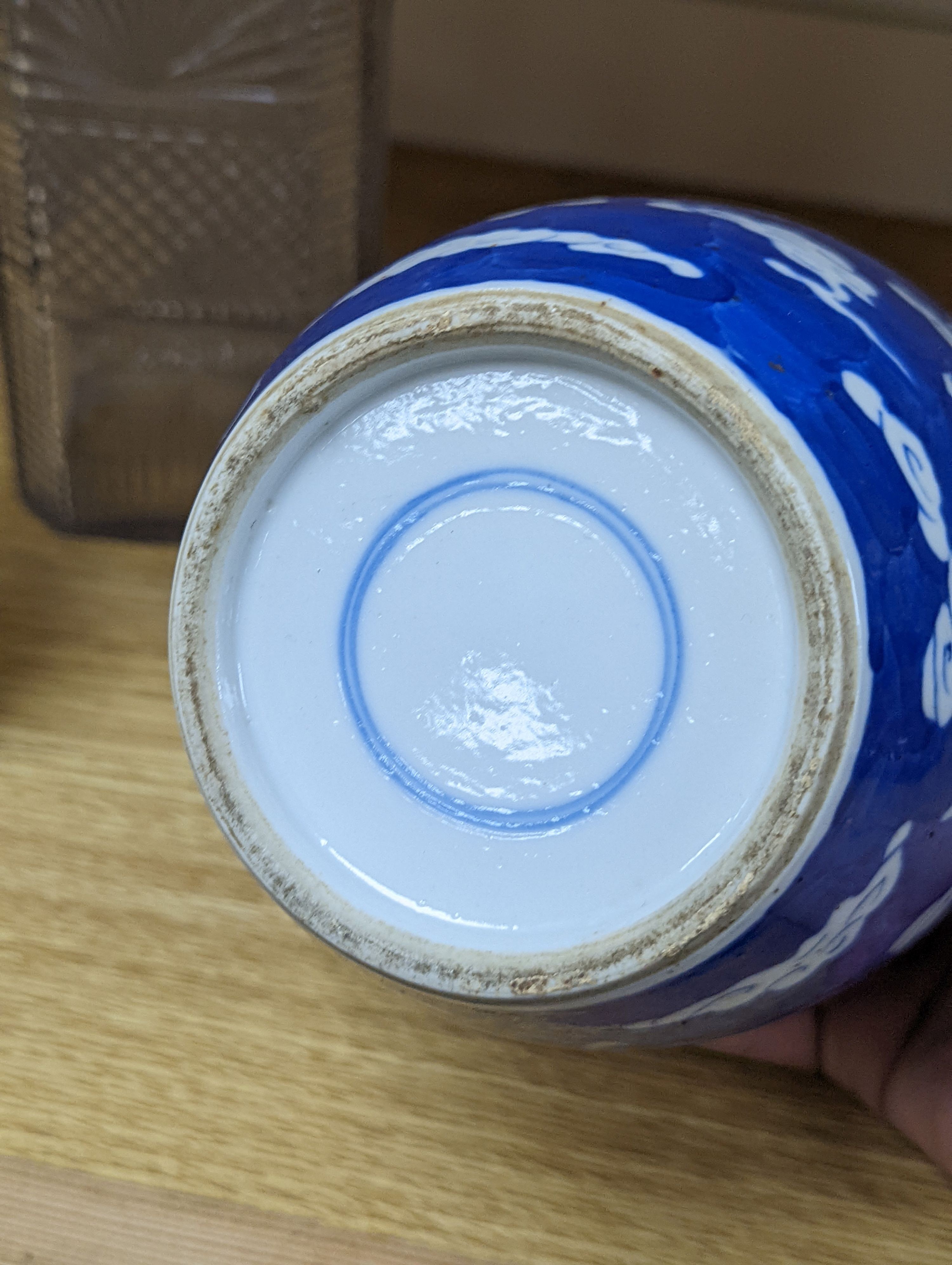 A 19th century Chinese famille rose rice bowl, cover and stand, together with a blue and white dragon jar and similar bottle vase. Largest 18cm